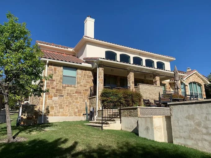Yellow stucco exterior paint Bee Cave TX