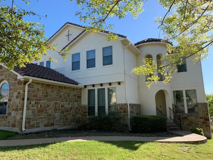 Stucco exterior yellow paint job Bee Cave TX